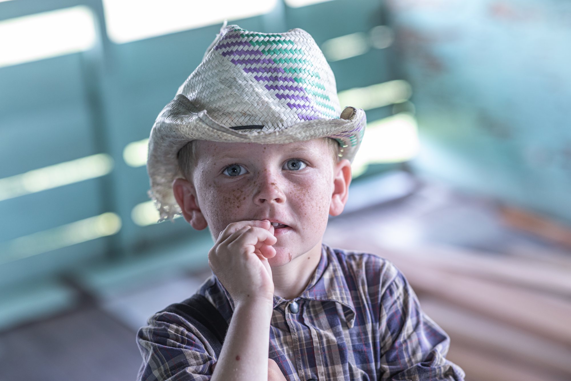 A boy and his straw hat