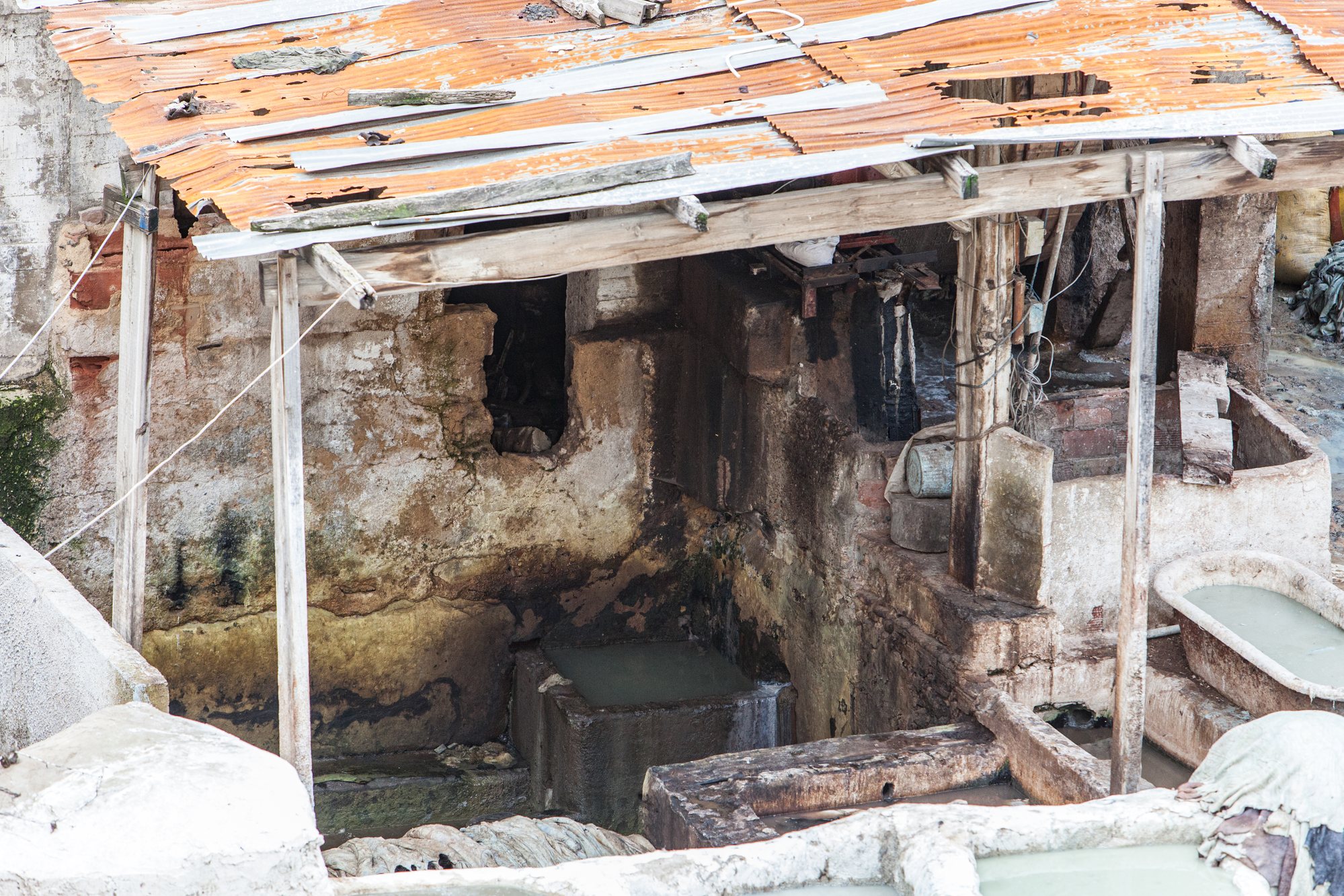 Rusted corrugated sheeting over the liming pits